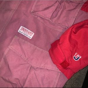 Undefeated rain coat